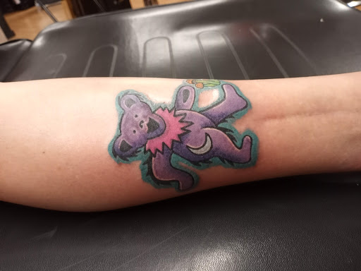 Explore leg flower tattoo ideas, creative tattoo ideas in Florence, available at West Coast Tattoo & Body Piercing