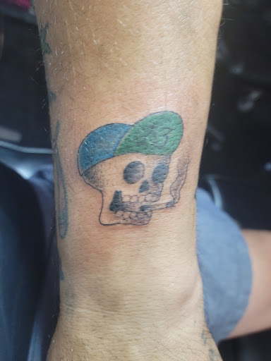 Explore wrist tattoo ideas male, creative tattoo ideas in Los Angeles, available at Tattoo Love & Body Piercing Co.