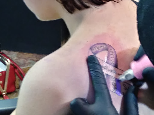 Explore flag tattoo ideas, creative tattoo ideas in Coeur D Alene, available at Black Matter Tattoo