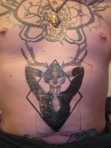 Explore family crest tattoo ideas, creative tattoo ideas in Saint Paul, available at Iron Rhino Tattoo