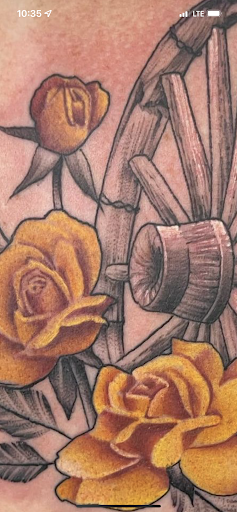 Explore tattoo ideas on the thigh, creative tattoo ideas in Benson, available at Dark Matter Tattoo Studio