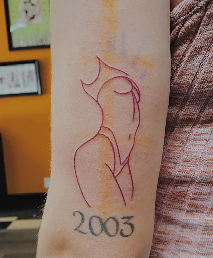 Find tattoo under breast ideas for your next unique tattoo in Stevens Point at Black Rabbit Tattooing