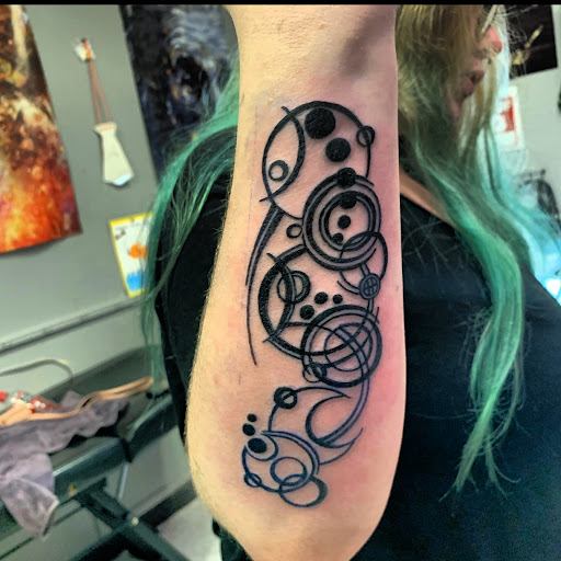 Find clouds tattoo ideas for your next unique tattoo in Hudson Falls at ALTERED ADDICTION TATTOOS