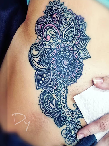 Explore tattoo ideas for mens, creative tattoo ideas in Benton, available at Spectrum Tattoo