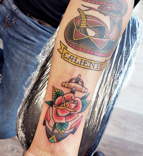 Explore blue rose tattoo ideas, creative tattoo ideas in Nashville, available at Titan Tattoo