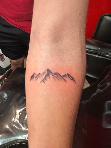 Explore small floral tattoo ideas, creative tattoo ideas in Southport, available at Inklanation Custom Tattoos