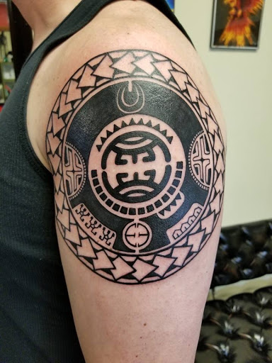 Explore tattoo ideas on ribs for guys, creative tattoo ideas in Peoria, available at Guerrilla Ink Tattoos