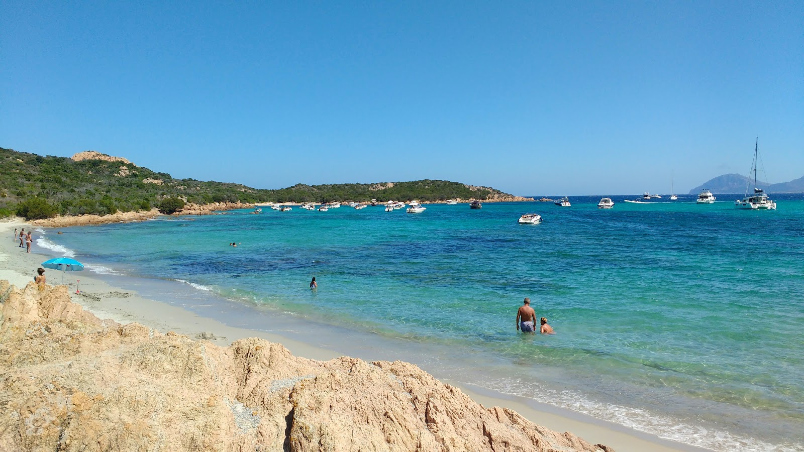 Foto di Cala Petra Ruja con una superficie del sabbia bianca