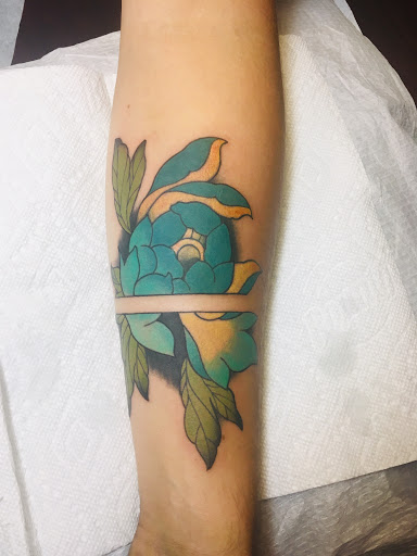 Explore girl tattoo ideas, creative tattoo ideas in Coldwater, available at Relevant Tattoo and Piercing