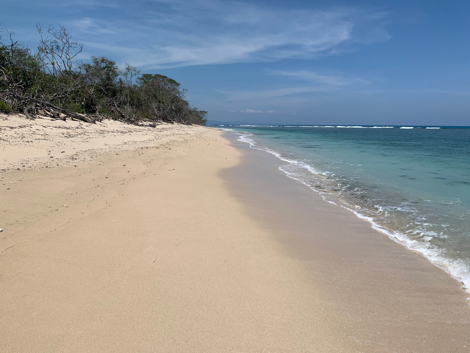 Fotografija Playa Cupellito z svetel pesek površino