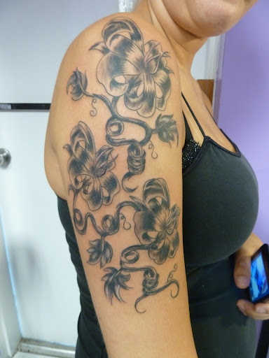 Tattoo Shop «The Lizard Lounge Tattoo Kissimmee», reviews and photos, 4519 S Orange Blossom Trail, Kissimmee, FL 34746, USA