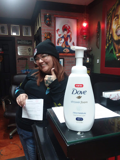 Explore hand tattoo cover up ideas, creative tattoo ideas in Coeur D Alene, available at Jojos Tattoo & Body Piercing