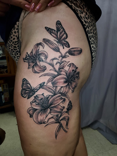 Explore tattoo ideas for women leg, creative tattoo ideas in Searcy, available at Multiverse Tattoos & Piercings LLC