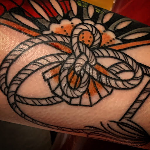 Explore foot ankle tattoo ideas, creative tattoo ideas in Houston, available at Houston Heights Tattoo & Piercing