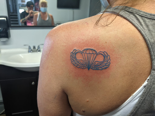 Explore rose tattoo cover up ideas, creative tattoo ideas in Littleton, available at Clean Slate Tattoo & Body Piercing Studio