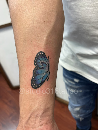 Explore snake tattoo ideas for men, creative tattoo ideas in Jackson Heights, available at studio 316 Tattoo & Body Piercing