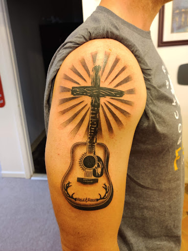 Explore upchurch tattoo ideas, creative tattoo ideas in Hebron, available at Explosive Ink Tattoo