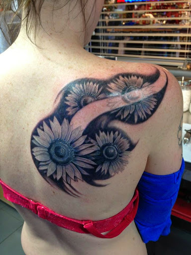 Explore ear tattoo ideas for females, creative tattoo ideas in Springfield, available at Kaleidoscope