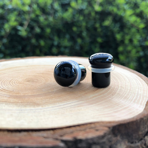 Explore male stomach tattoo ideas, creative tattoo ideas in Olympia, available at Metro Body Piercing