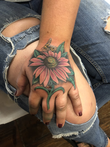 Explore cover up tattoo ideas female arm, creative tattoo ideas in Wappingers Falls, available at Graceland Tattoo