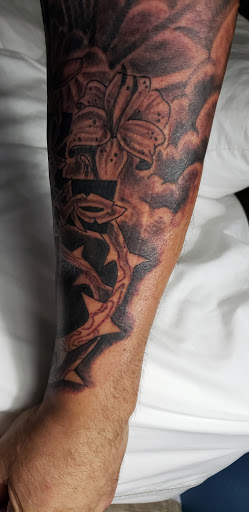 Explore ff7 tattoo ideas, creative tattoo ideas in Spokane, available at Platinum Rose Tattoo Studio