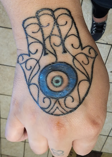 Explore dreamer tattoo ideas, creative tattoo ideas in Chicago, available at Revolution Tattoo