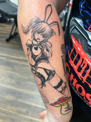 Explore locket tattoo ideas, creative tattoo ideas in Ocala, available at Black Lotus Tattoo & Art Gallery Inc