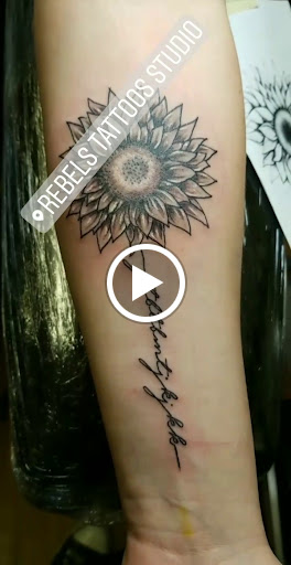 Explore scarlet witch tattoo ideas, creative tattoo ideas in Wenatchee, available at Rebels Tattoo Studio
