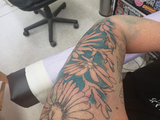 Explore broken tattoo ideas for guys, creative tattoo ideas in Casper, available at Electric Hare Tattoo