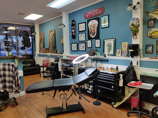 Explore cool leg tattoo ideas, creative tattoo ideas in Stuart, available at Tiger Shark Tattoo Studio
