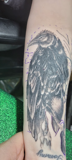 Explore blessed neck tattoo ideas, creative tattoo ideas in Canton, available at DEAD KAT TATTOO