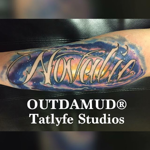 Explore back of head tattoo ideas, creative tattoo ideas in Savannah, available at Tatlyfe Studios