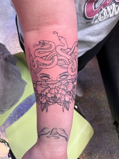 Explore crime scene tattoo ideas, creative tattoo ideas in Garden City, available at Branded Bear Tattoo