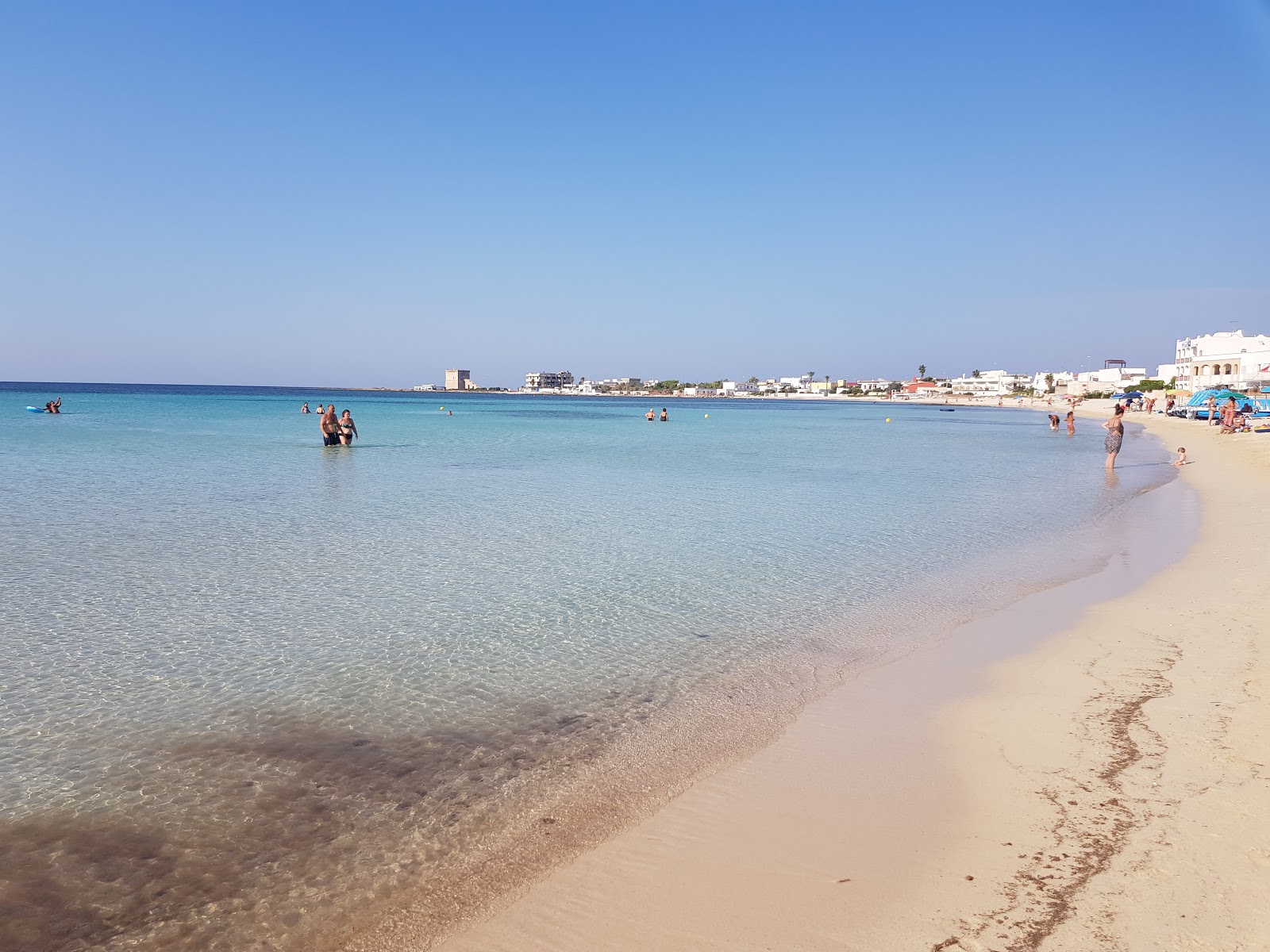 Fotografie cu Spiaggia Porto Cesareo cu o suprafață de nisip strălucitor