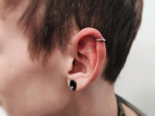 Explore tattoo cross ideas for men, creative tattoo ideas in Minneapolis, available at Almost Famous Body Piercing