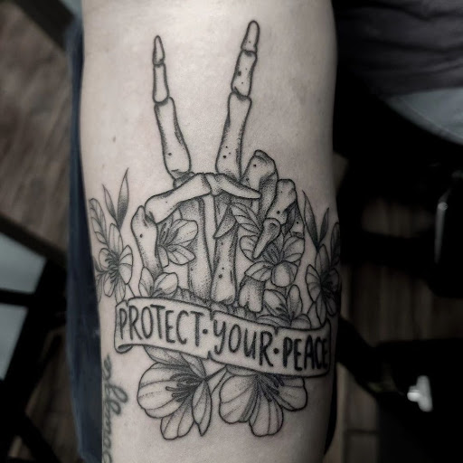 Explore tattoo cover up ideas for men, creative tattoo ideas in Calhoun, available at A Sailors Grave Tattoo Parlor