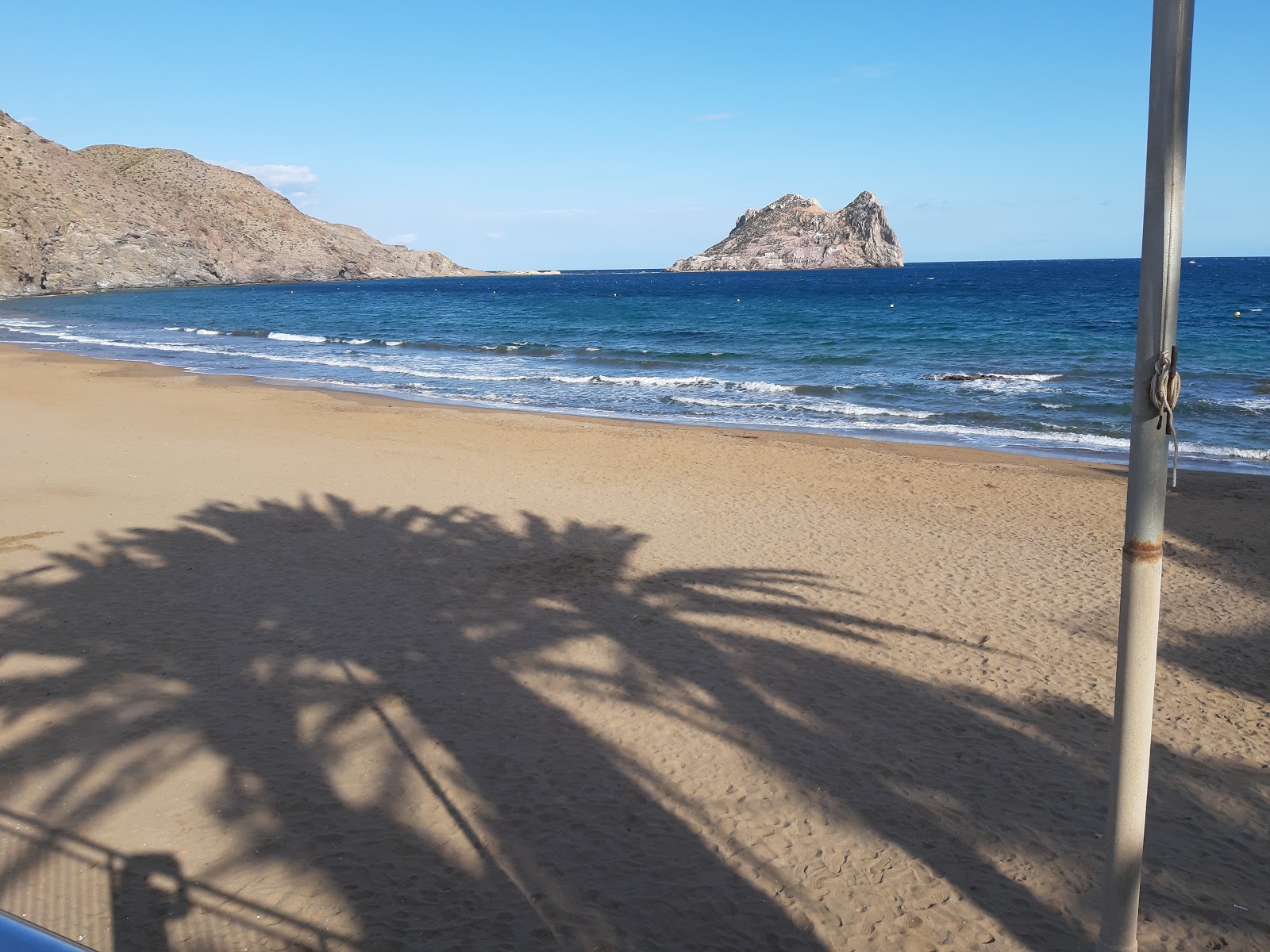 Foto von Playa El Hornillo mit brauner sand Oberfläche