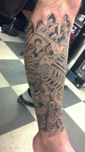 Explore grunge tattoo ideas, creative tattoo ideas in Pelham, available at Tattoo Fever