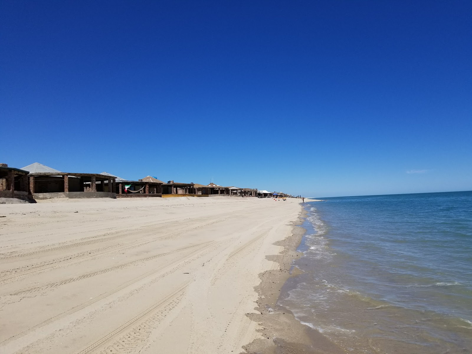 Fotografija Playa Hermosa z svetel pesek površino