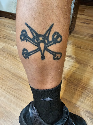 Explore unique side thigh tattoo ideas, creative tattoo ideas in Harrisburg, available at Rayzor Tattoos