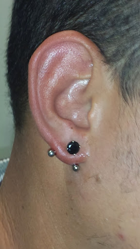 Explore dark cover up tattoo ideas male, creative tattoo ideas in Sarasota, available at Z-Edge Tattoo and Body Piercing North Shop