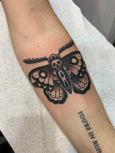 Explore heart with wings tattoo ideas, creative tattoo ideas in Montclair, available at Rise Above Tattoo Co.