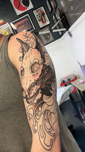 Explore outer arm tattoo ideas, creative tattoo ideas in Buford, available at Inked Arts Tattoo Studio