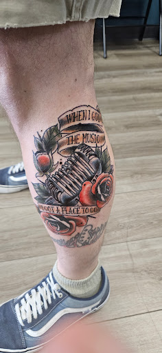 Explore ambition tattoo ideas, creative tattoo ideas in Omaha, available at Grinn & Barrett Tattoo