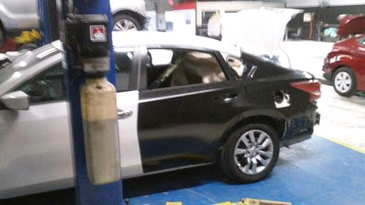 Auto Body Shop «Antillana Car Service Car Paint Shop», reviews and photos, 6363 E Colonial Dr g, Orlando, FL 32807, USA