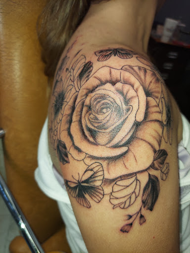 Find between the boob tattoo ideas for your next unique tattoo in Odessa at Little Dragon Tattoos Studio