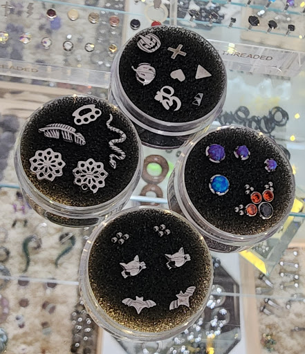 Explore paw print tattoo ideas, creative tattoo ideas in Kokomo, available at Beatnik piercing & jewelry