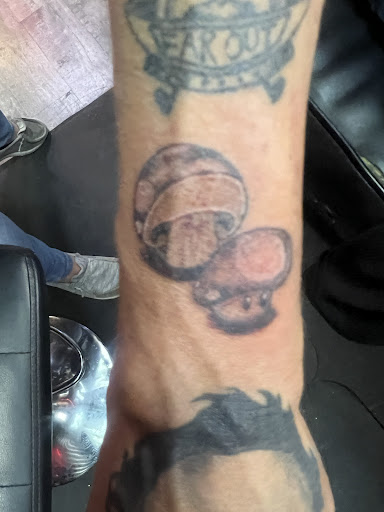 Explore love hate tattoo ideas, creative tattoo ideas in Linn Creek, available at Hillard Skillard Tattoos, LLC.