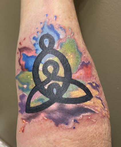 Explore motocross tattoo ideas, creative tattoo ideas in Powell, available at Tattoo Saga