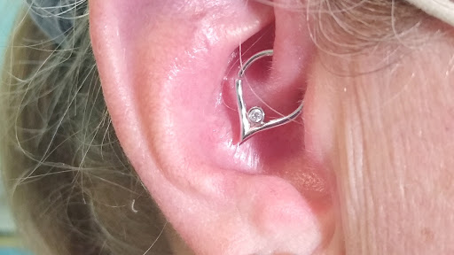 Explore reading tattoo ideas, creative tattoo ideas in Bella Vista, available at Erins Aesthetics